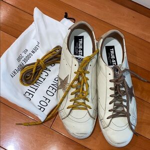 Golden Goose Cream and Gold Star Sneakers